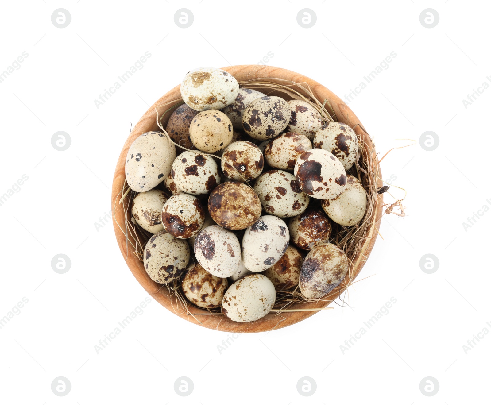 Photo of Wooden bowl with quail eggs and straw isolated on white, top view