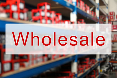 Image of Wholesale business. Blurred view of shelving unit with merchandise at warehouse