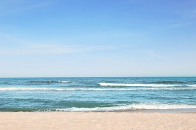 Photo of Picturesque view of beautiful sea and sandy beach on sunny day