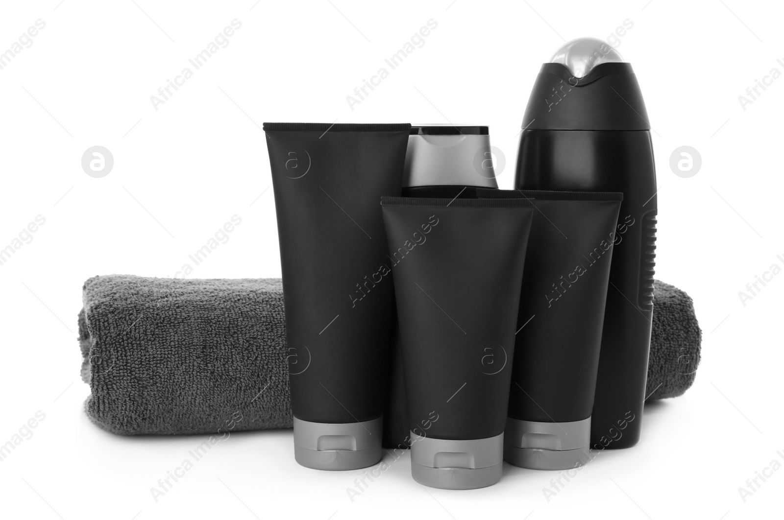 Photo of Set of men's cosmetic products and towel on white background