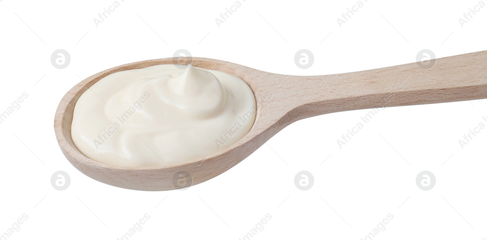 Photo of One wooden spoon with mayonnaise isolated on white