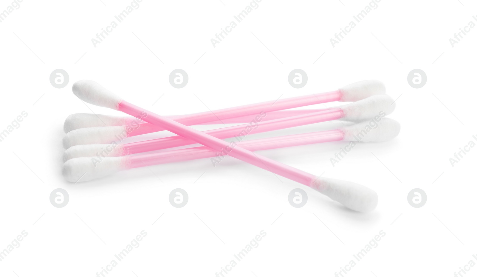 Photo of Pink plastic cotton swabs on white background