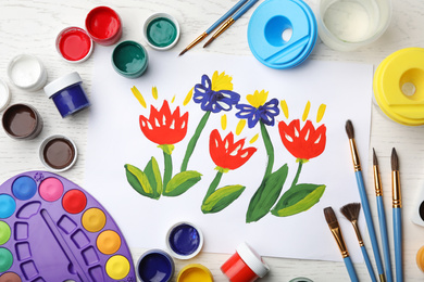 Photo of Flat lay composition with child's painting of flowers on white wooden table
