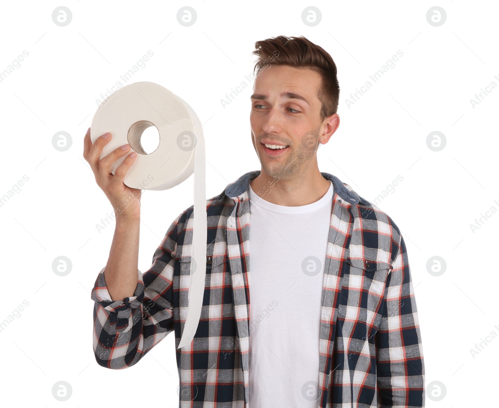 Photo of Young man holding toilet paper roll on white background