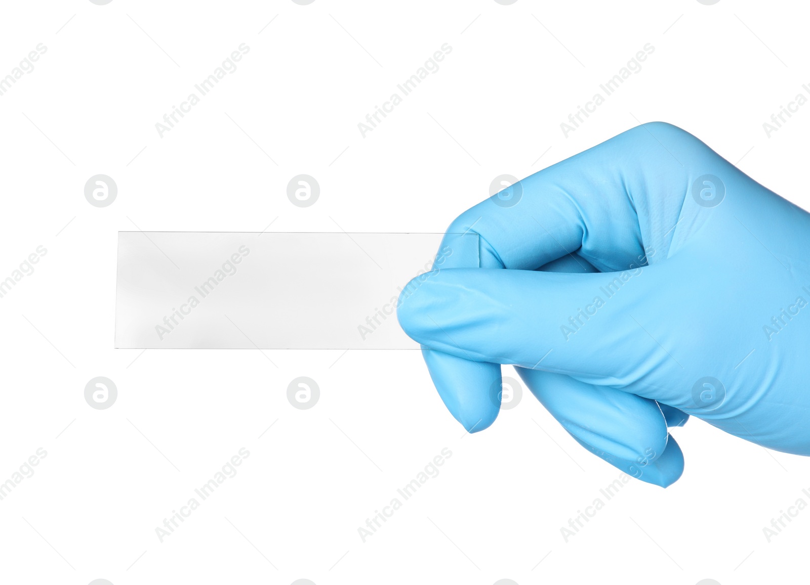 Photo of Scientist holding clean microscope slide on white background, closeup