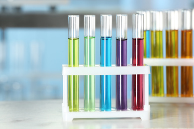 Test tubes with liquid samples on table. Laboratory analysis