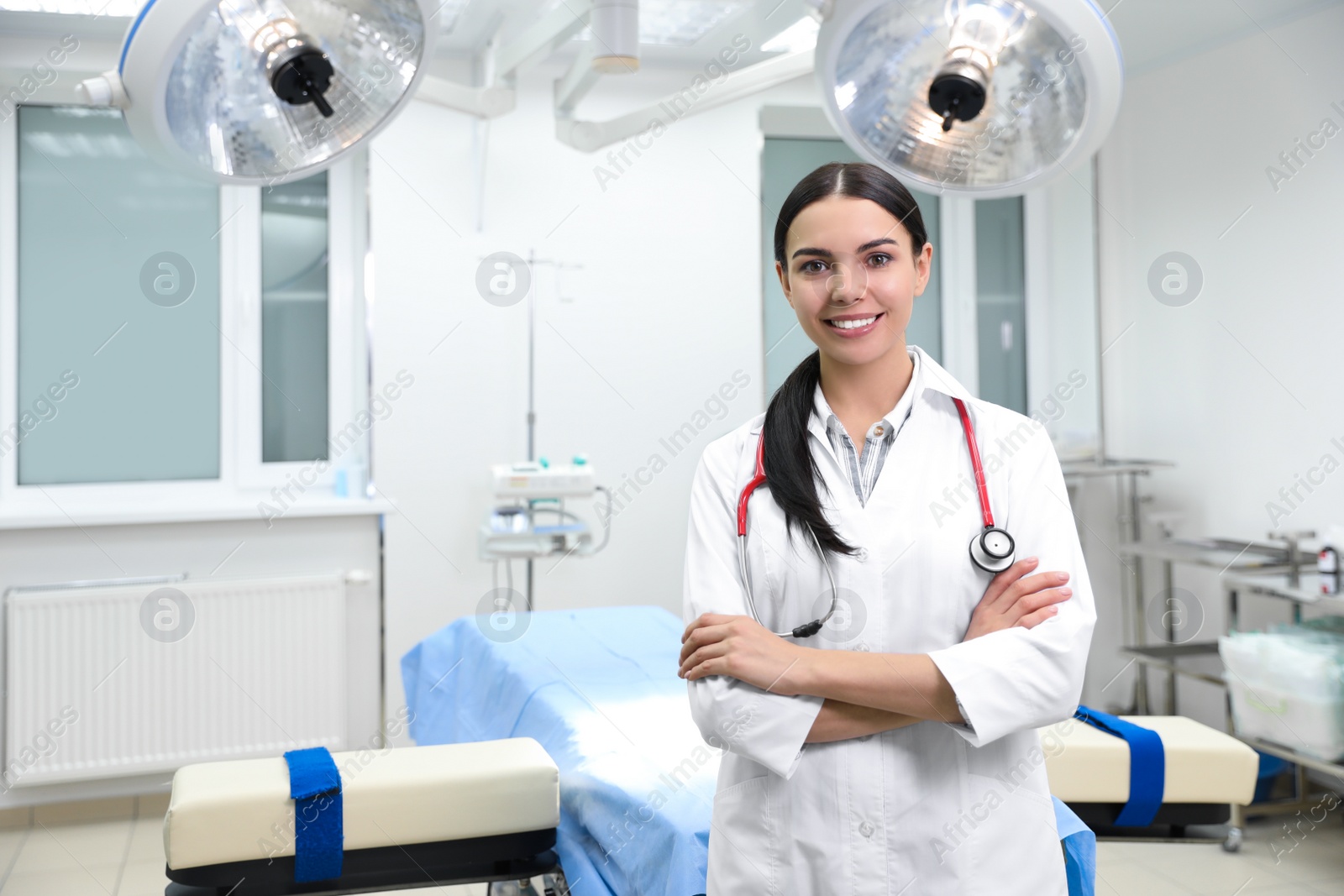 Photo of Portrait of professional doctor in modern surgery clinic. Space for text