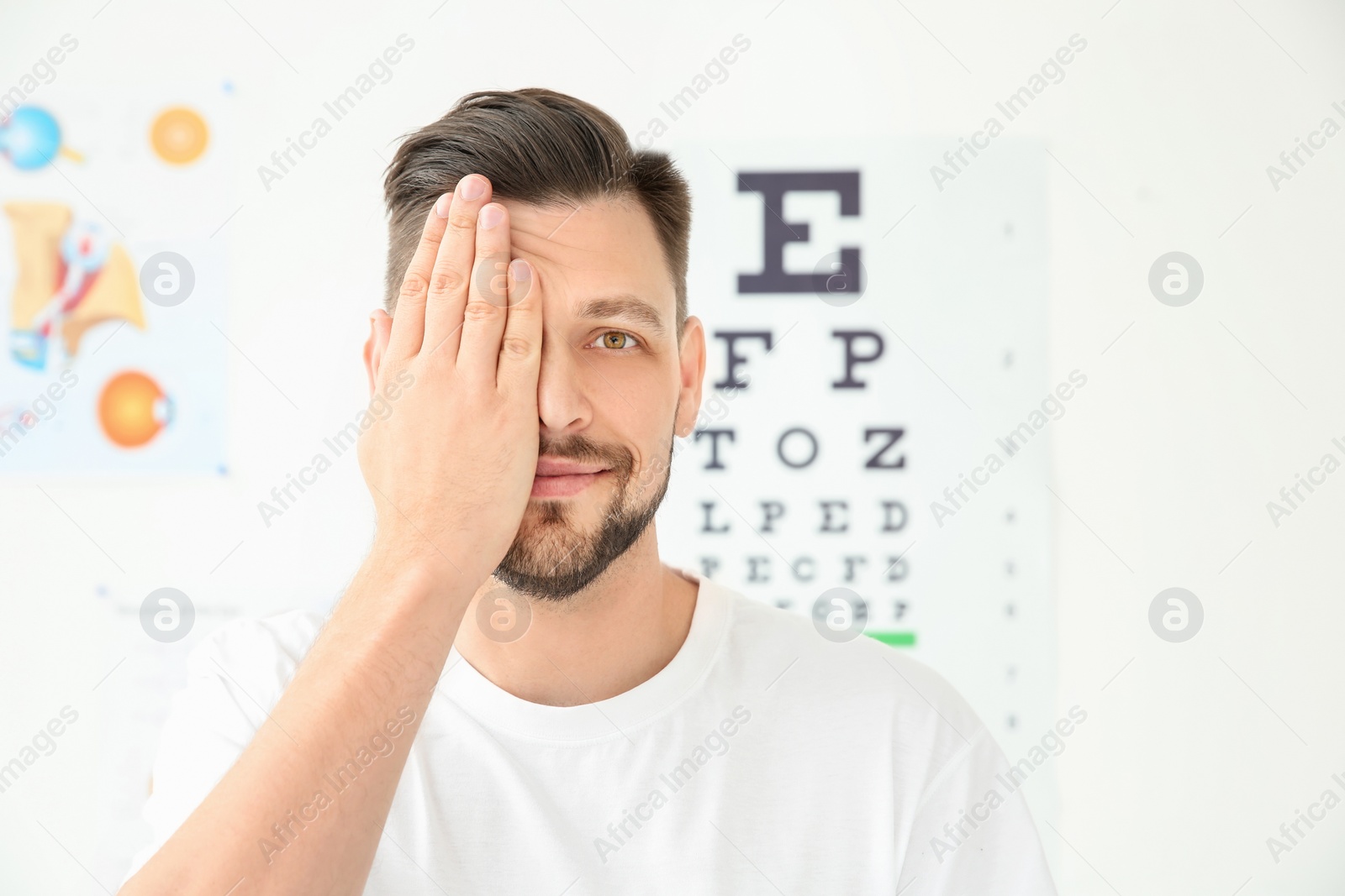 Photo of Young man visiting ophthalmologist