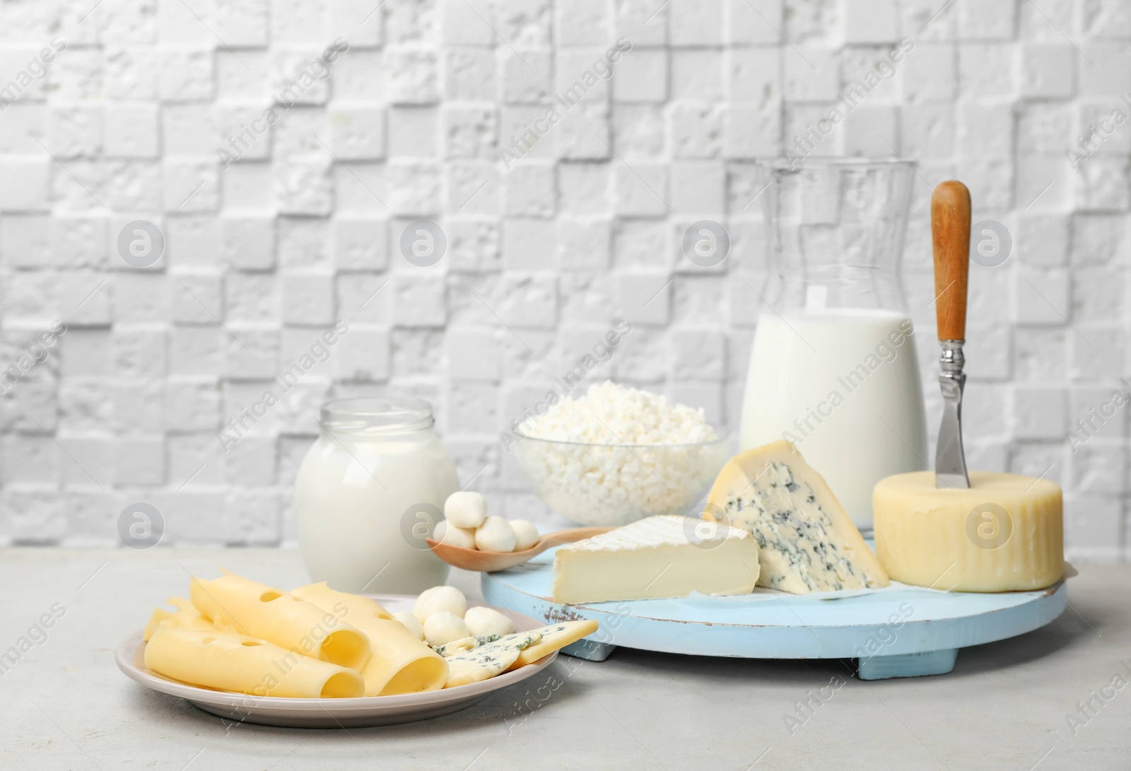 Photo of Different fresh dairy products on table