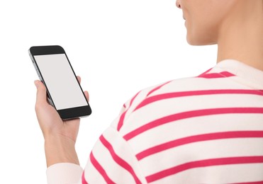 Photo of Woman holding smartphone with blank screen on white background, closeup. Mockup for design