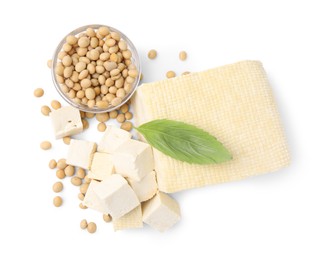 Photo of Delicious tofu cheese, basil and soybeans isolated on white, top view