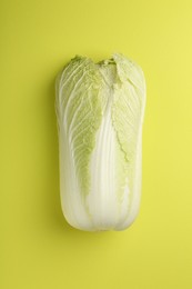 Photo of Fresh ripe Chinese cabbage on green background, top view