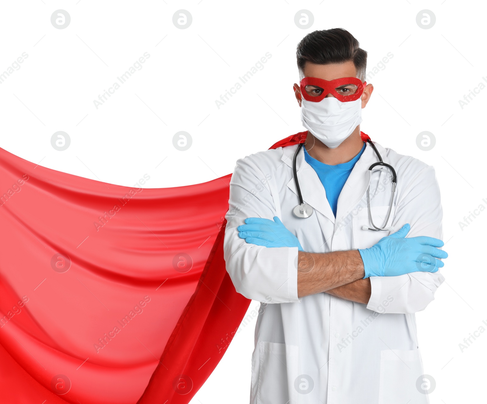 Photo of Doctor wearing face mask and cape on white background. Super hero power for medicine