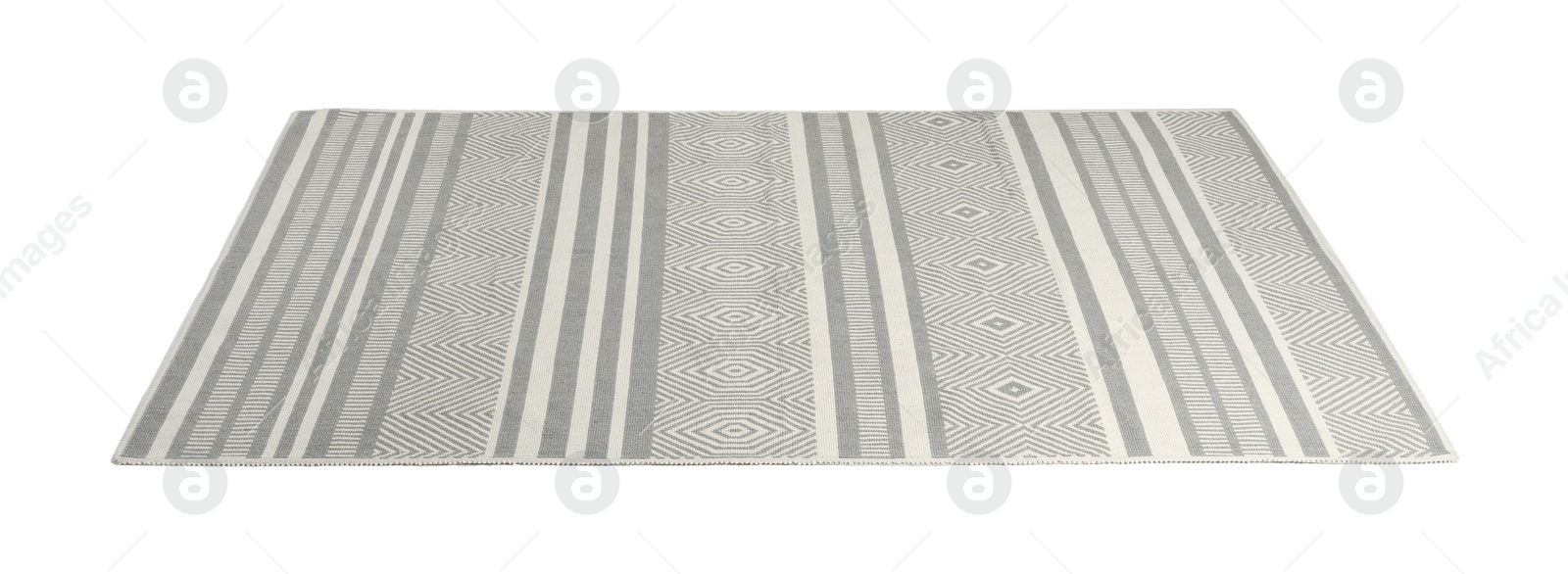 Photo of Soft carpet with geometric pattern isolated on white