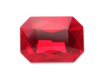 Photo of Beautiful red gemstone for jewelry isolated on white, top view
