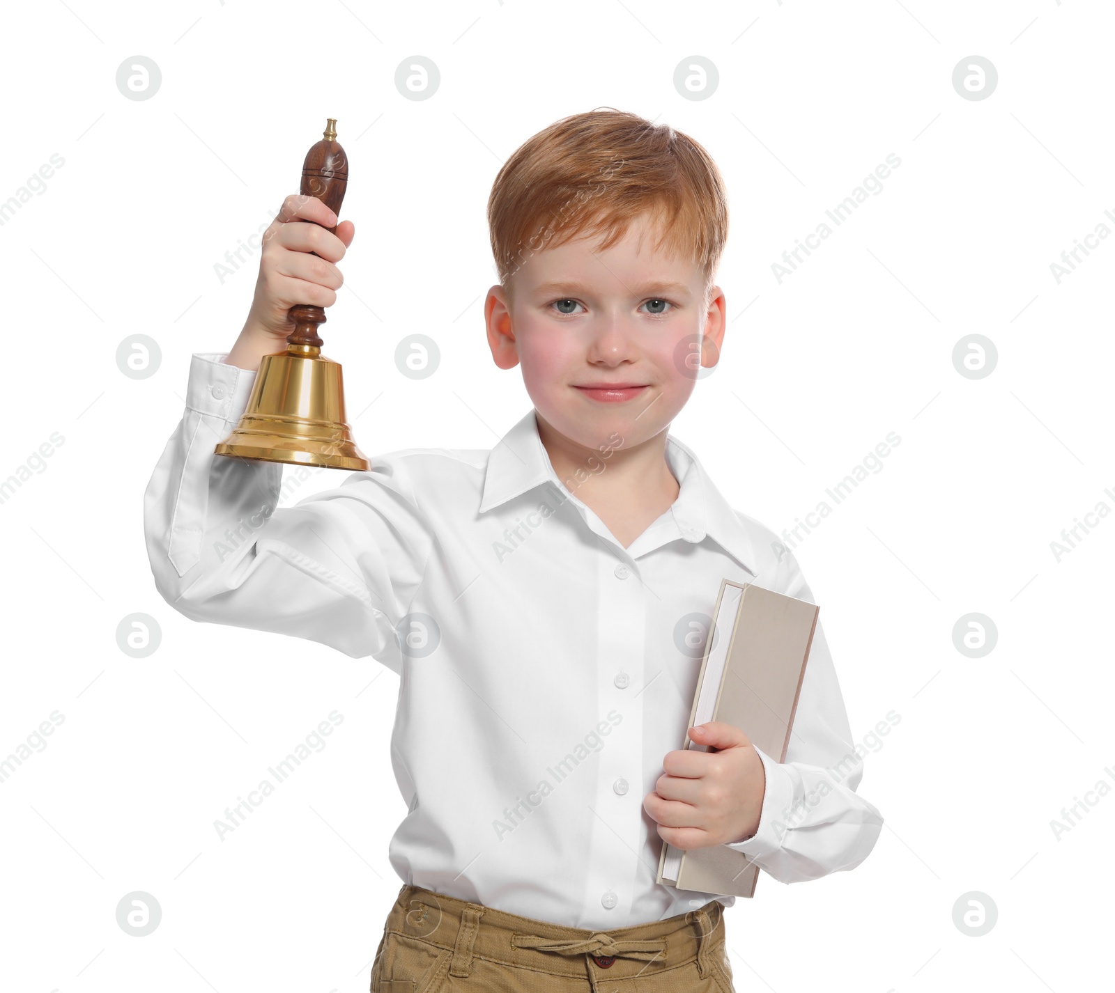 Photo of Pupil with school bell and book on white background