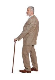 Senior man with walking cane on white background