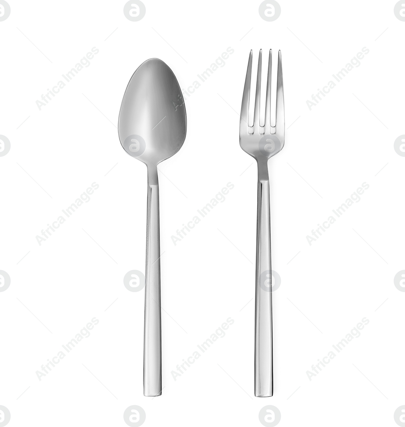 Image of Shiny silver spoon and fork on white background, top view