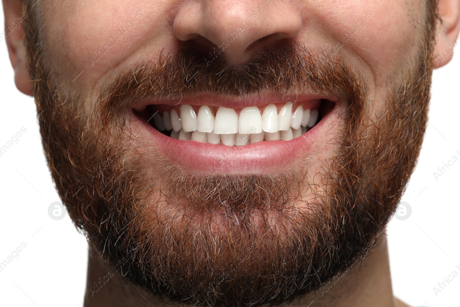 Photo of Smiling man with healthy clean teeth on white background, closeup