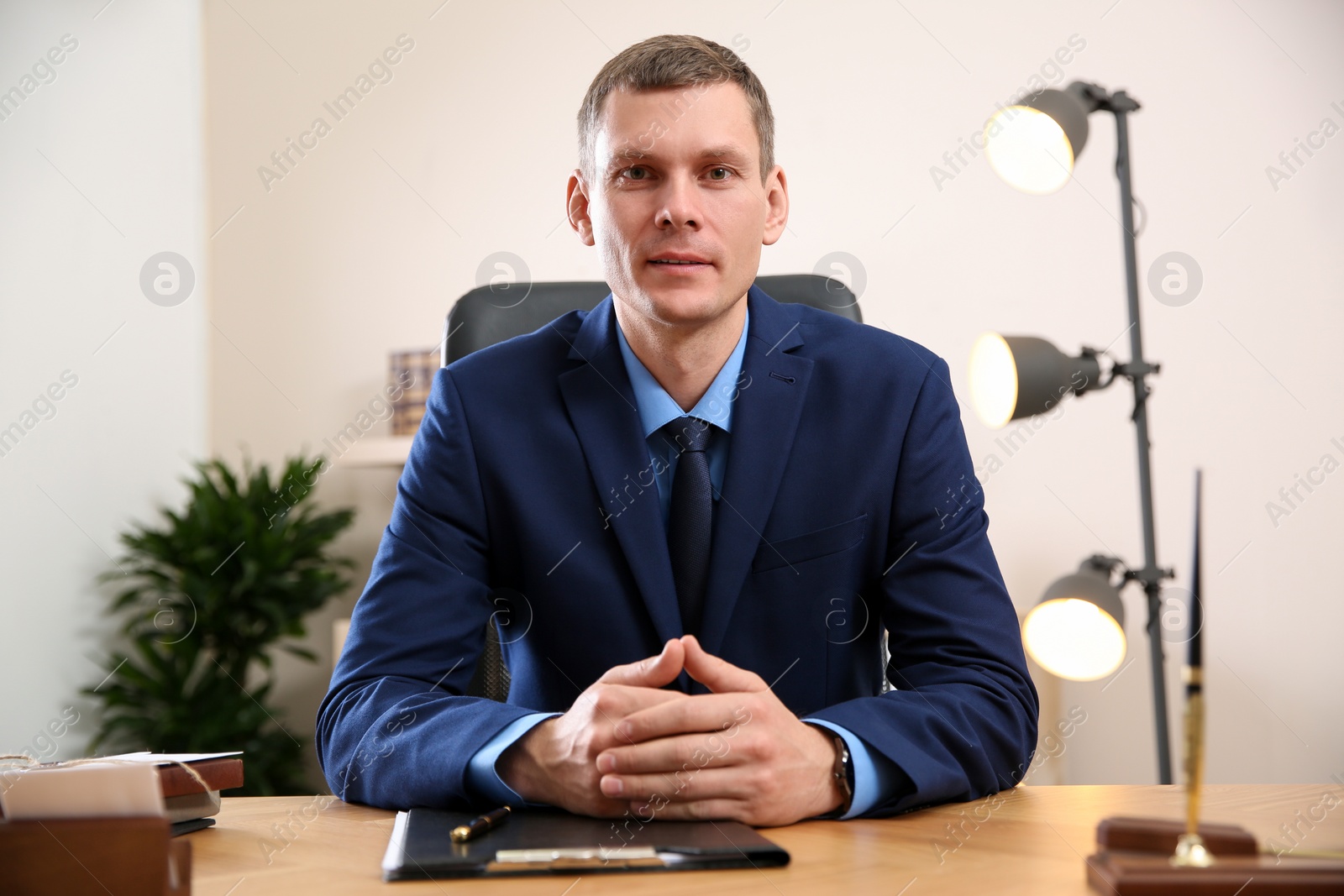 Photo of Man using video chat in office, view from web camera