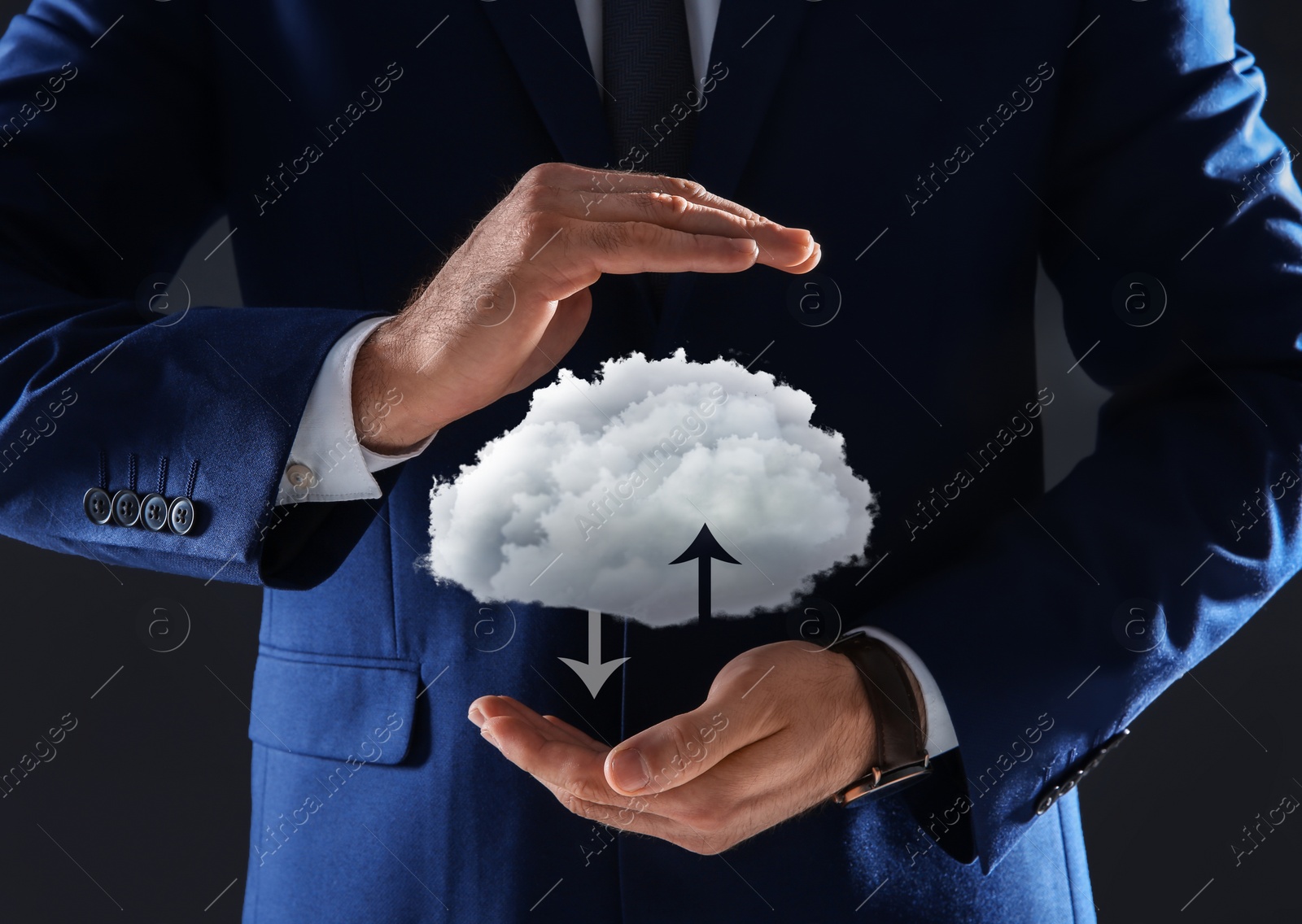 Image of Modern storage technology concept. Man holding cloud on black background, closeup