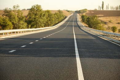 Photo of Beautiful view of empty asphalt highway. Road trip