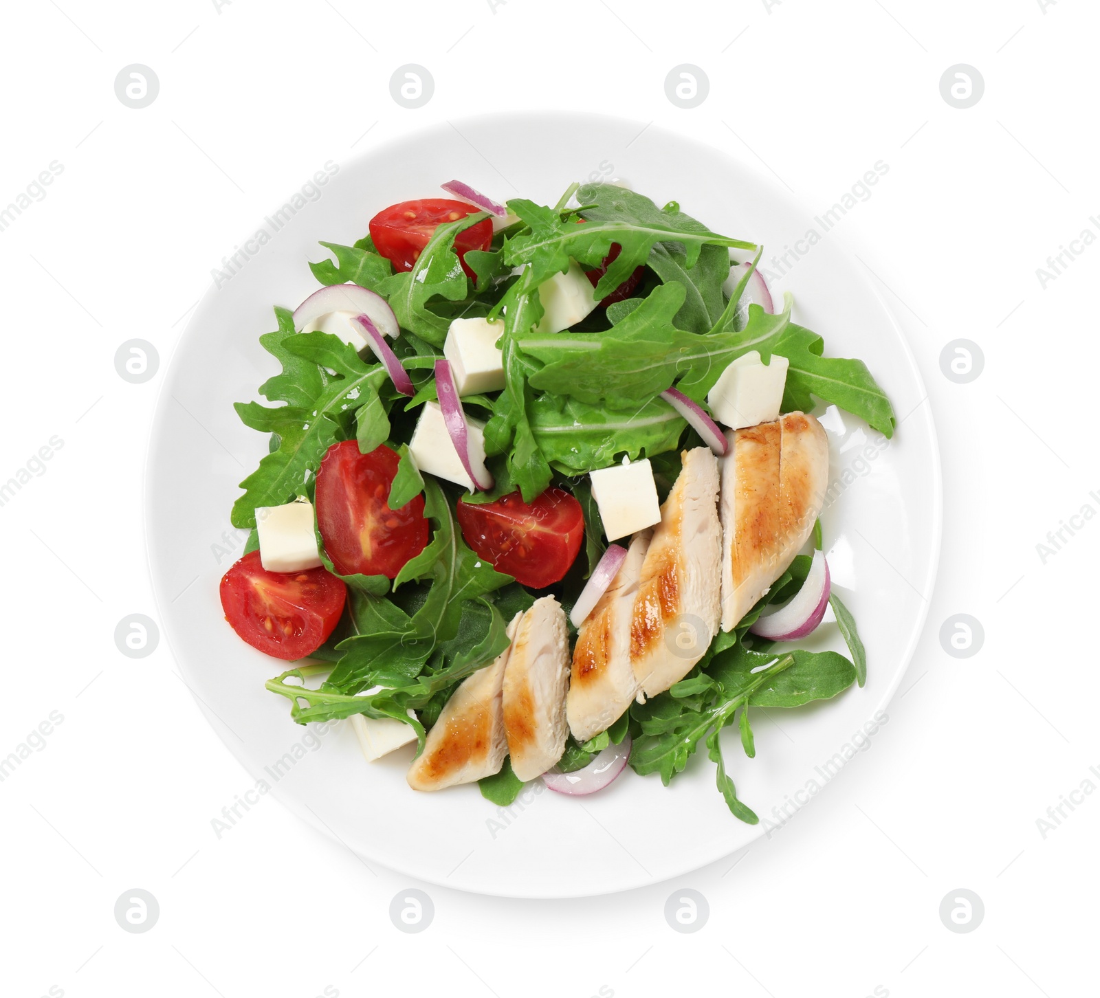 Photo of Delicious salad with meat, arugula and vegetables isolated on white, top view