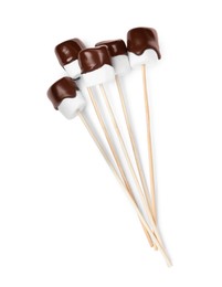 Photo of Tasty marshmallows dipped into chocolate on white background, top view