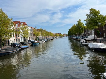 Photo of Beautiful viewbuildings near canal and boats on sunny day