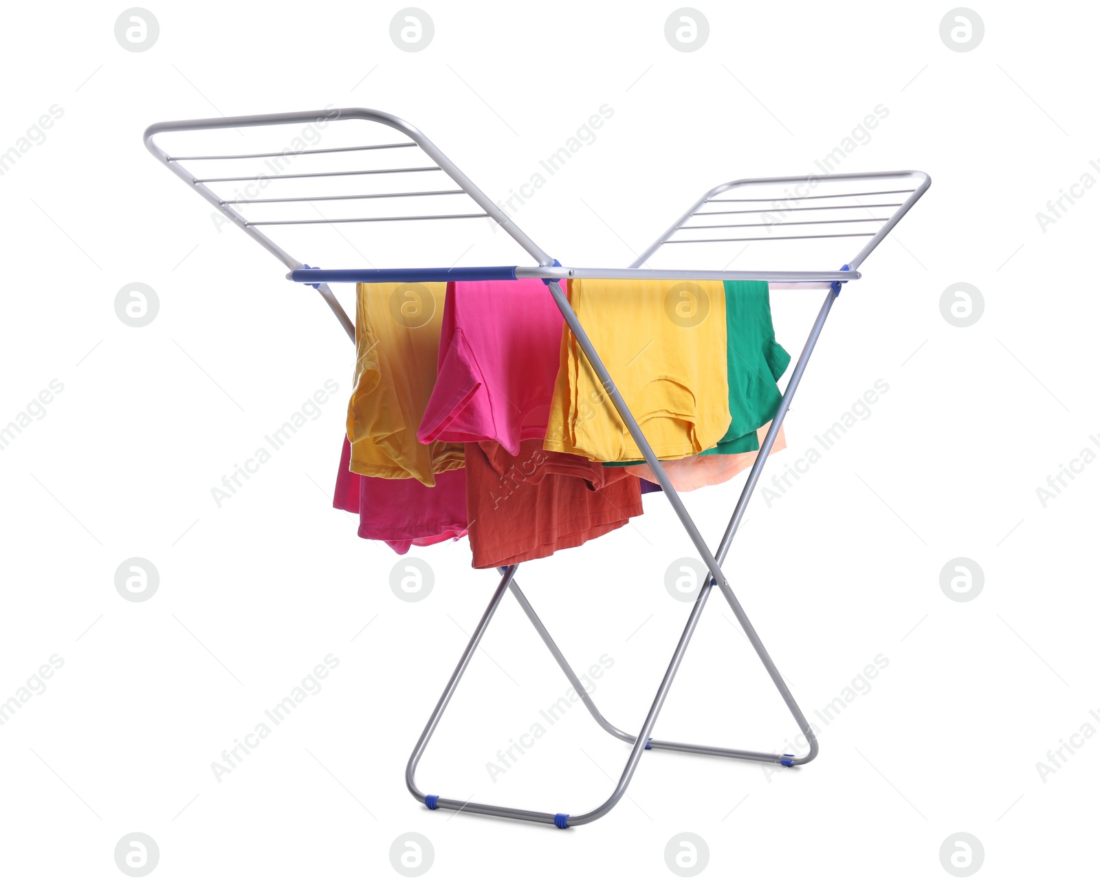 Photo of Clean laundry hanging on drying rack against white background