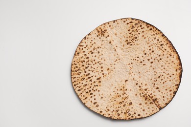 Photo of Tasty matzo isolated on white, top view. Passover (Pesach) celebration