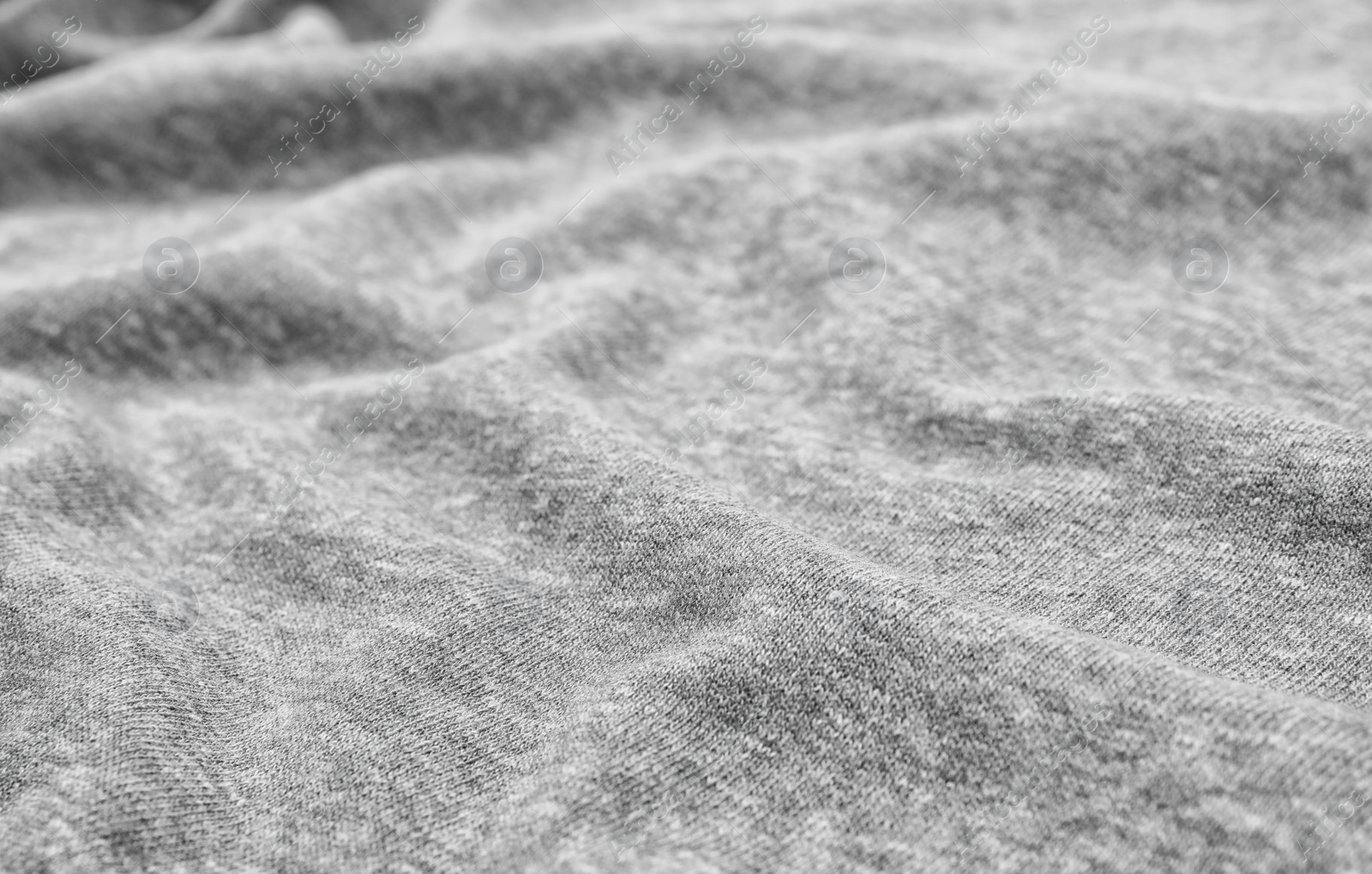 Photo of Texture of cozy warm sweater as background, closeup