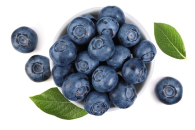 Photo of Fresh ripe blueberries and leaves isolated on white, top view
