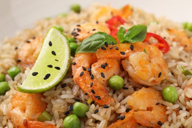 Photo of Tasty rice with shrimps and vegetables, closeup