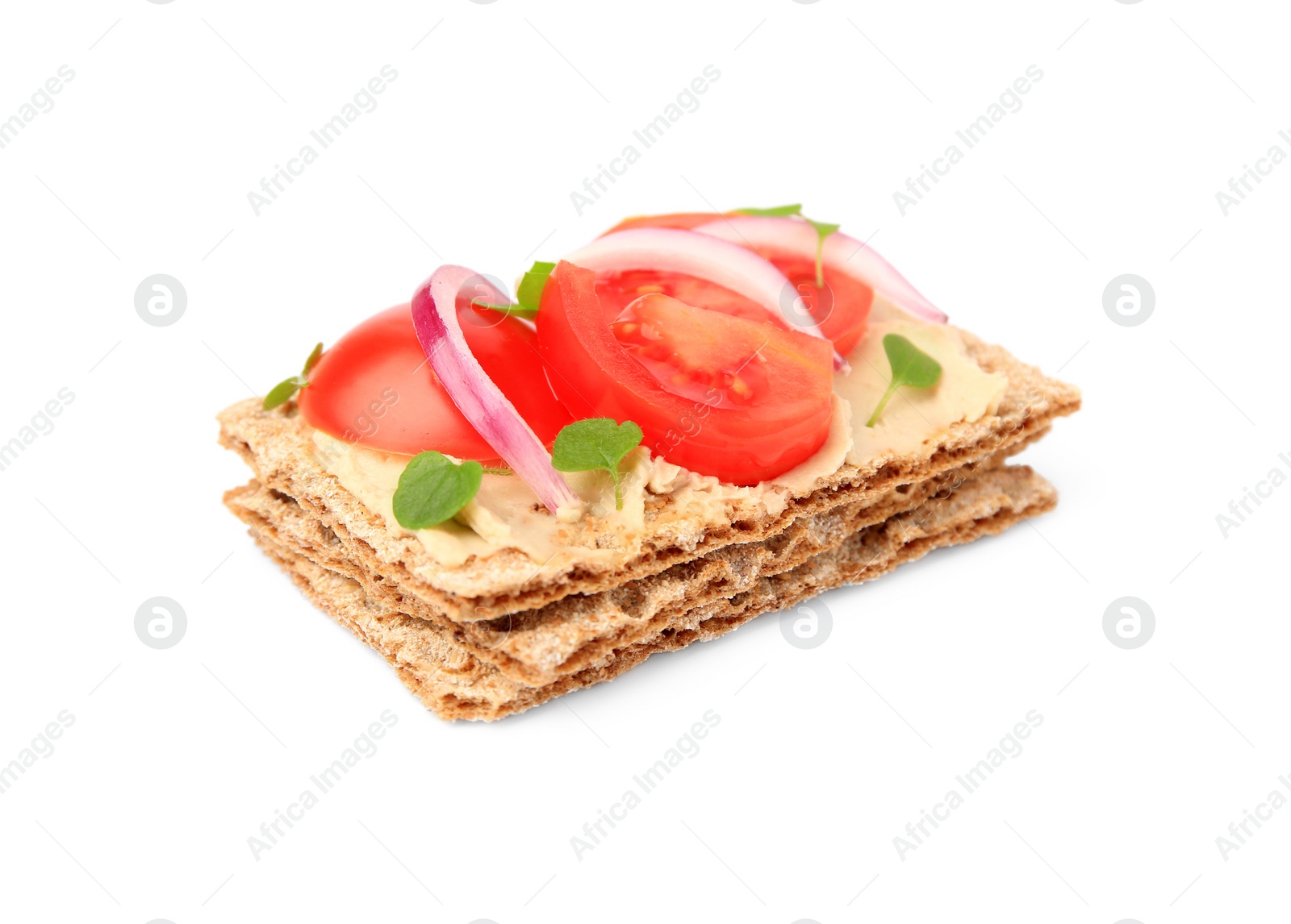 Photo of Fresh crunchy crispbreads with pate, tomatoes, red onion and greens isolated on white