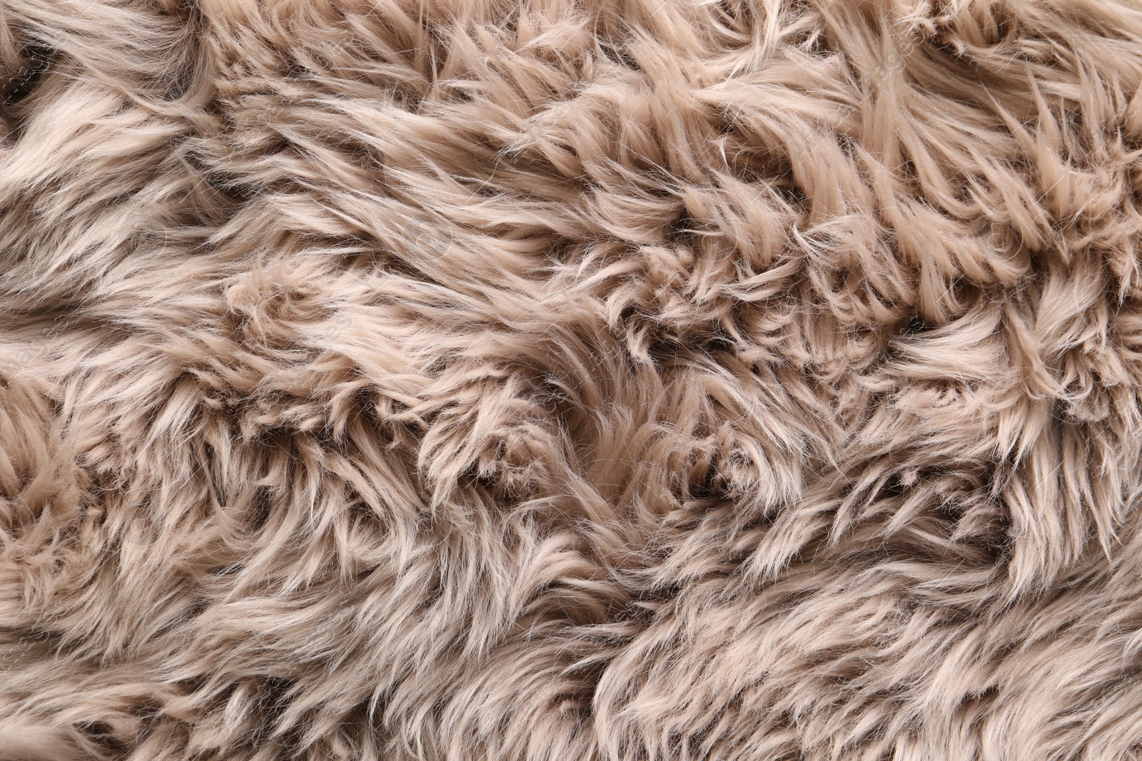 Photo of Texture of faux fur as background, top view