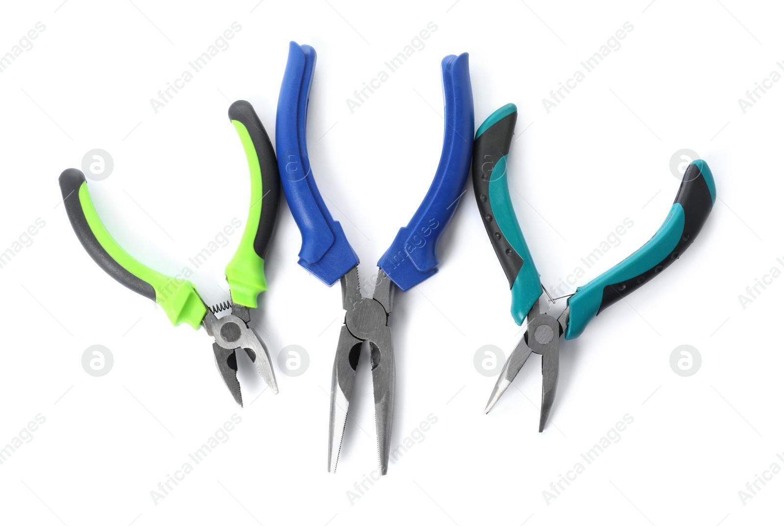 Photo of Different pliers isolated on white, top view