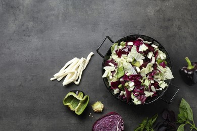Photo of Delicious salad with Chinese cabbage, suluguni cheese and bell pepper on grey table, flat lay. Space for text