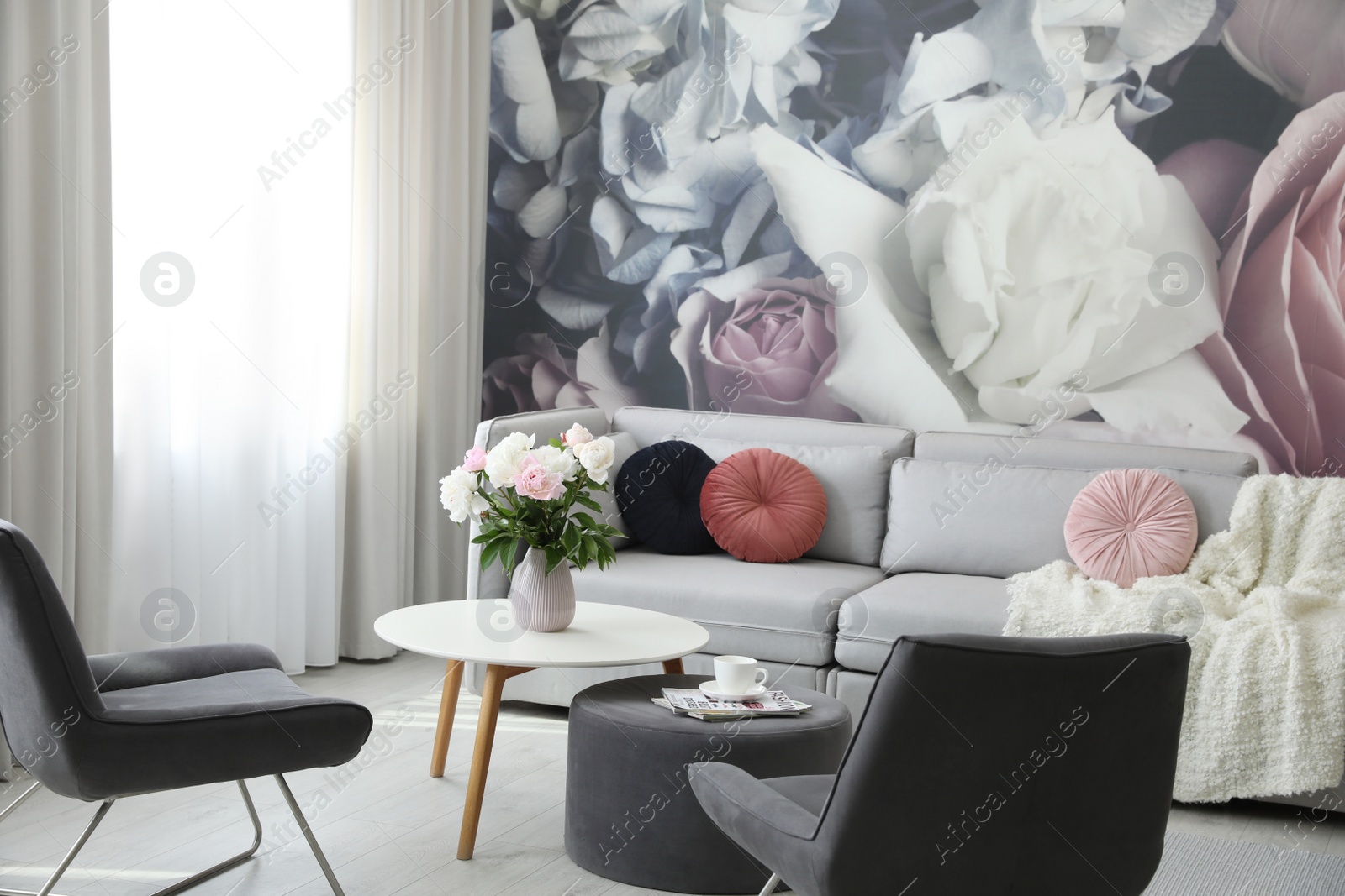 Photo of Modern living room interior with comfortable sofa and armchairs