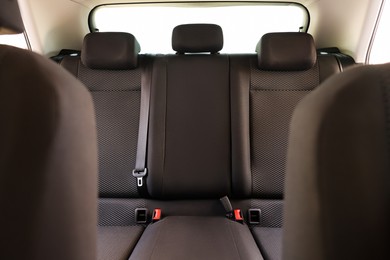 Photo of Stylish car interior with comfortable passenger seats