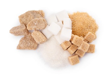 Different types of sugar on white background, top view