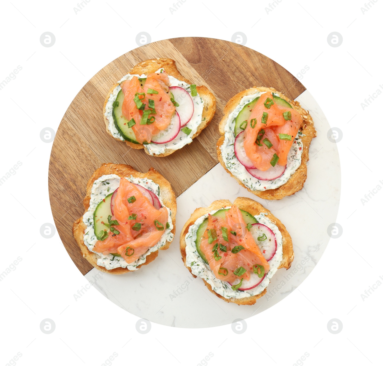 Photo of Tasty canapes with salmon, cucumber, radish and cream cheese isolated on white, top view