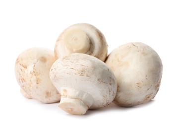 Fresh champignon mushrooms isolated on white. Healthy food