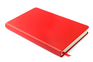 Photo of Stylish red hardcover notebook isolated on white. Office stationery