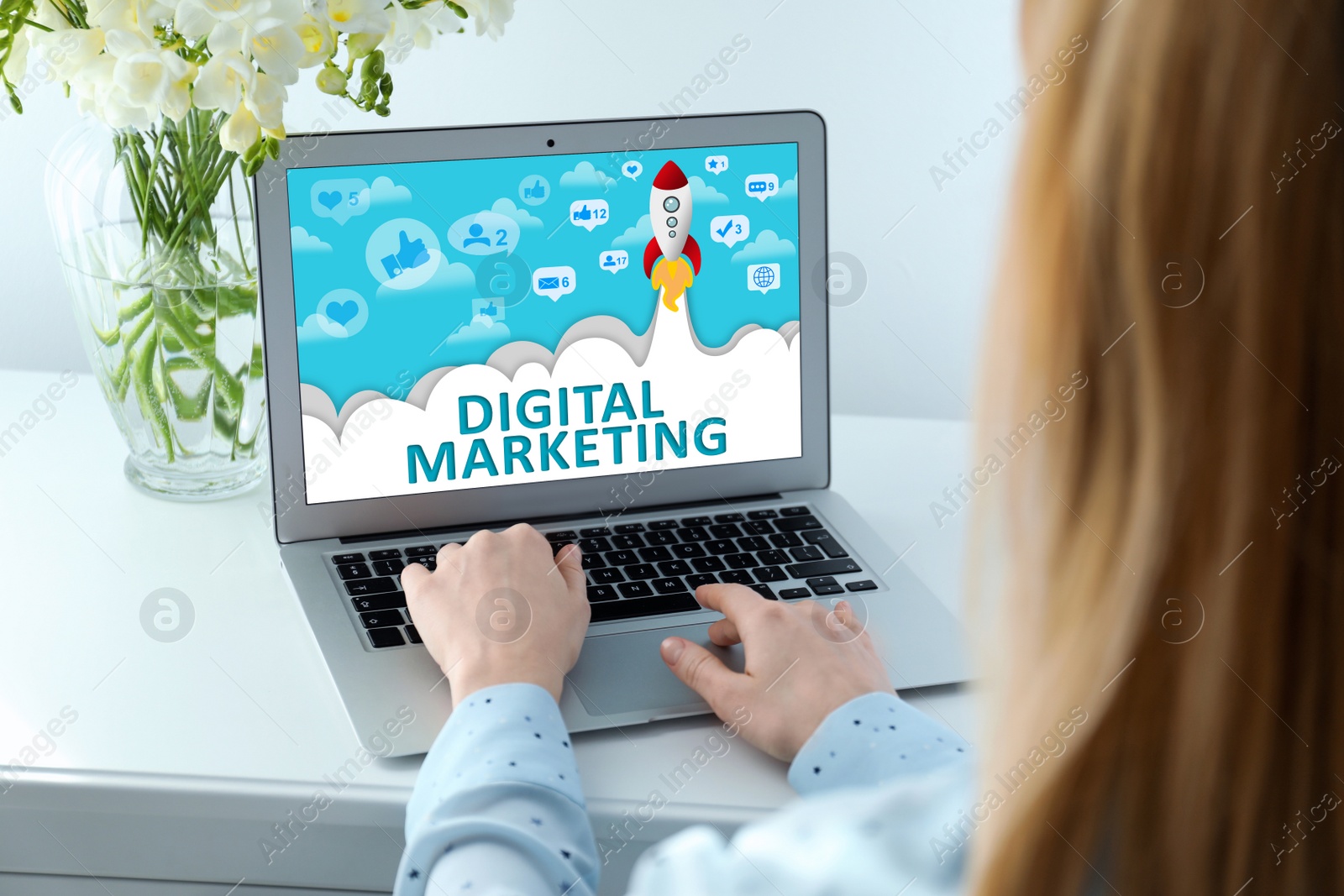 Image of Digital marketing concept. Woman working with laptop at table indoors, closeup