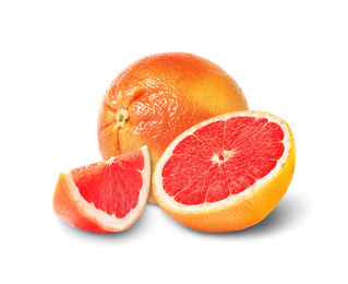 Image of Whole and cut grapefruits on white background