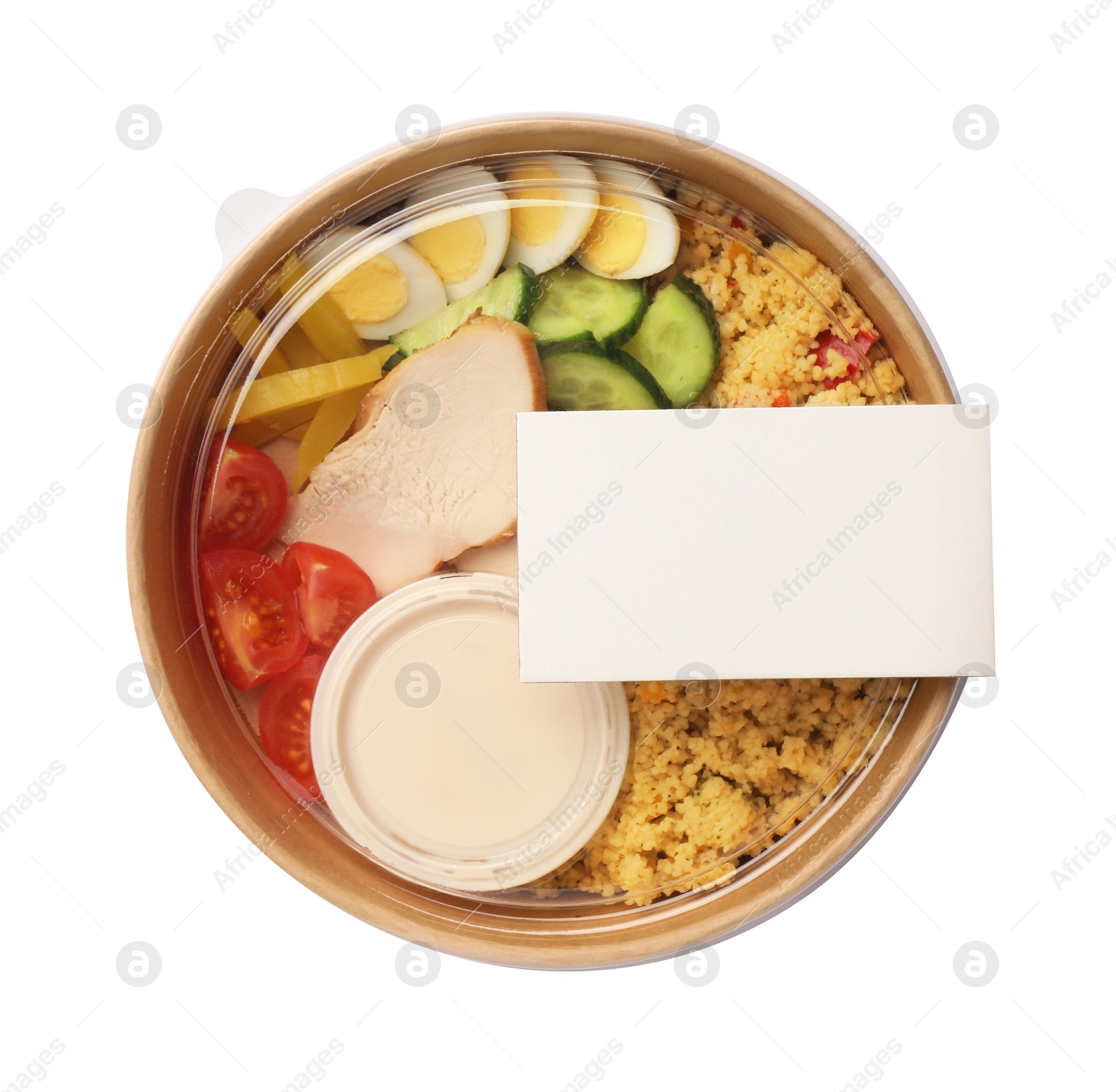 Photo of Tasty food in container isolated on white, top view