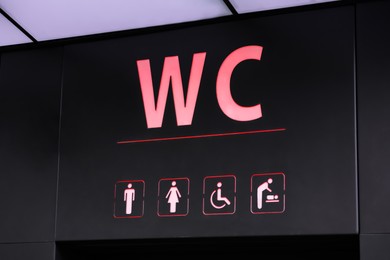 Image of Sign of public toilet with different symbols