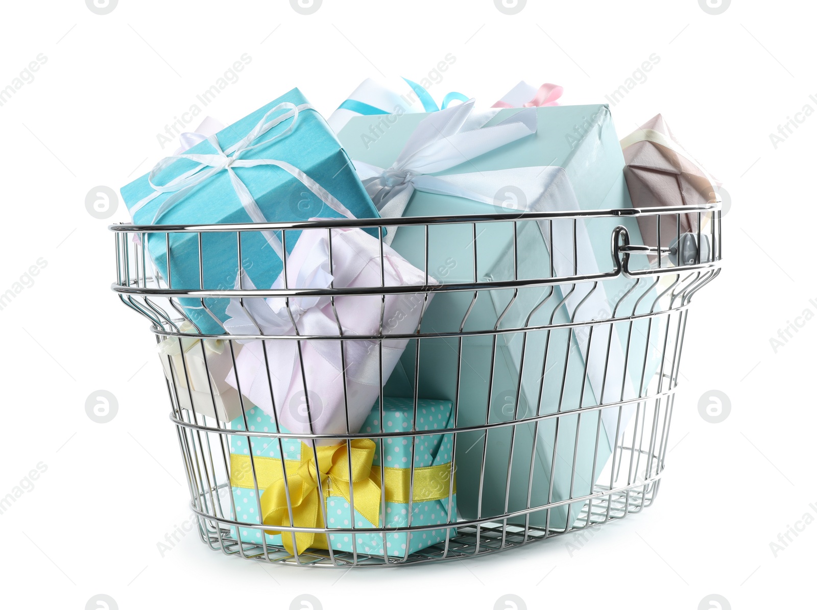 Photo of Shopping basket full of gift boxes on white background