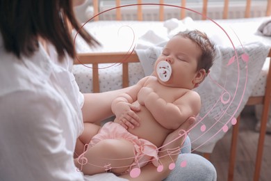 Image of Mother singing lullaby to her sleepy baby at home. Music notes illustrations flying around woman and child